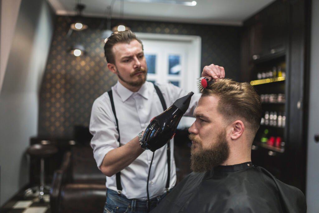 stylish man getting his haircut in Best barbershop in Vaughan
